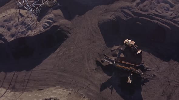 Industrial Loader Unloads Petroleum Coke On Conveyor Belt At Zug Island In Detroit,  Michigan, USA.