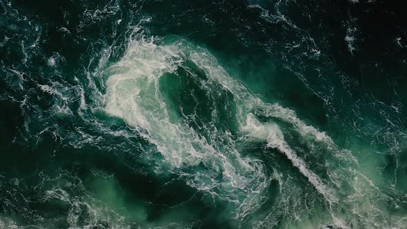 Waves of Water of the River and the Sea Meet Each Other During High Tide and Low Tide