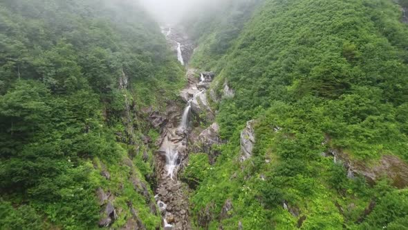 Incredible deep drone flight into the lush green waterfalls high in the mountains of Rize, Turkey. A