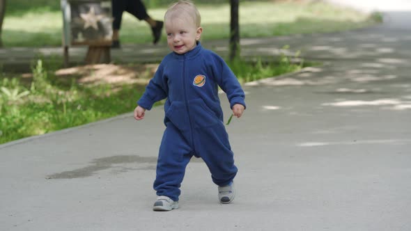 Mother and Child Walking in the Park in Summer Happy 1