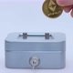 Male Hand Puts a Cryptocoin Ethereum or ETH in a Small Grey Vault Safe or Piggy Bank Depicting - VideoHive Item for Sale