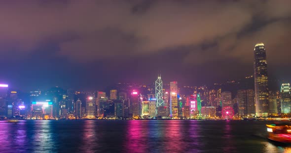 Aerial tNight Imelapse of Illuminated Hong Kong Skyline. Hong Kong, China