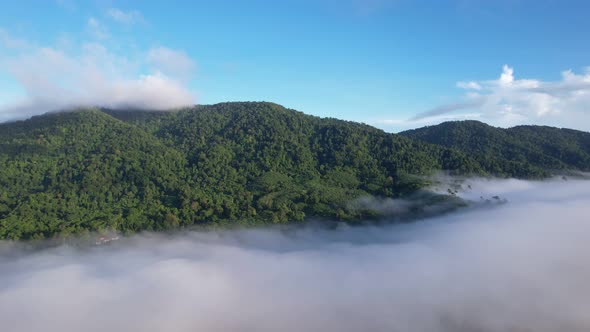 Drone view flying over sea of mist or fog Landscape High angle view