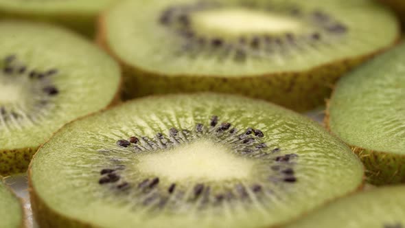 Kiwi Slices Closeup, Macro Food Summer Background, Fruits Top View. Rotate