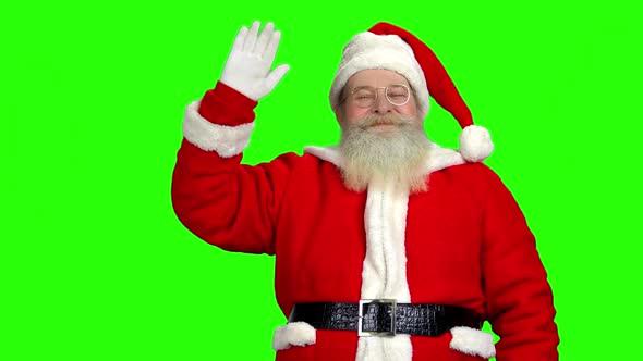 Santa Waving Hand, Chromakey Background.