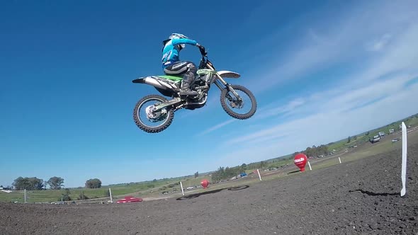 Men racing in a motocross motor sports race.