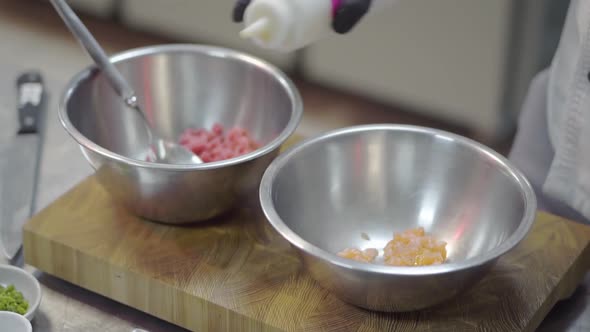 Chef Preparing Seafood in Modern Restaurant Kitchen