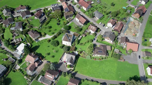 Aerial View of Liechtenstein with Houses on Green Fields in Alps Mountain Valley