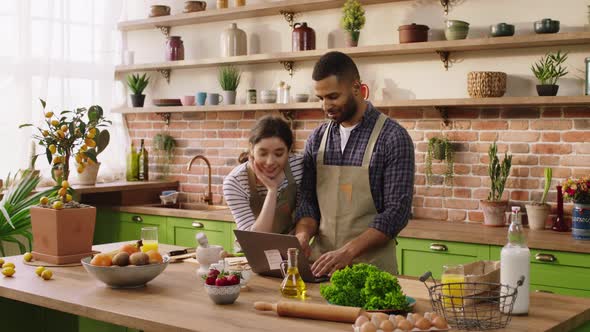 Great Time for a Couple Multiracial Cooking