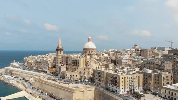 Mediterranean Sea promenade and baroque style architecture of Valletta , Malta