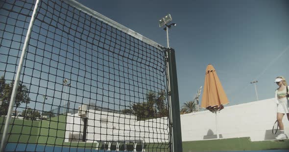 Tennis Player Walking On To Court