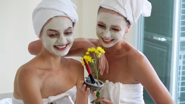 Beautiful Woman Having a Facial Treatment at Spa