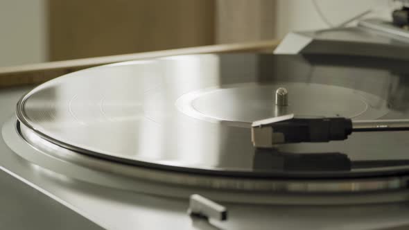 Modern Vinyl Turntable Playing at Home