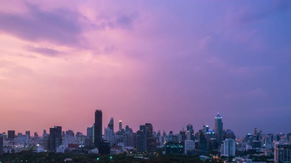 Day and night transition time lapse of cityscape and buildings in metropolis