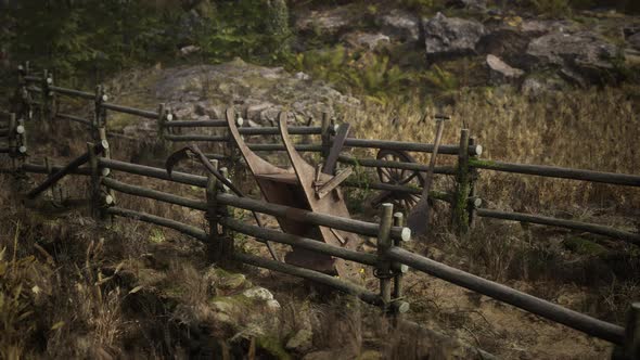 Old Rural Abandoned Wooden Village Under Cloudy Sky in Autumn Season alt