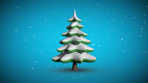 Snow falling on revolving fir tree