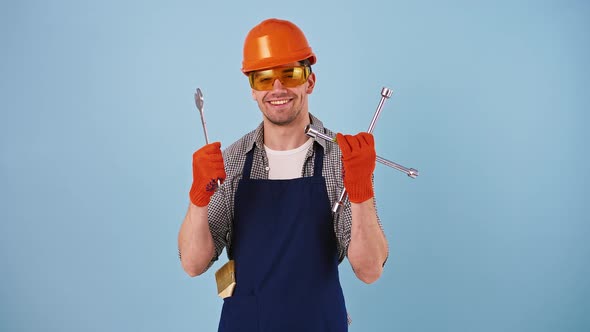 Man in Hard Hat Protective Goggles and Gloves