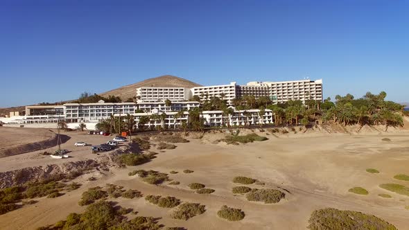 Aerial view of buildings in front of the beach at Sotavento lagoon beach.