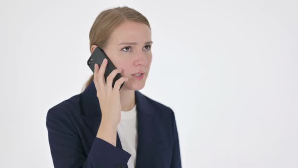 Aggressive Young Businesswoman Angry on Smartphone on White Background