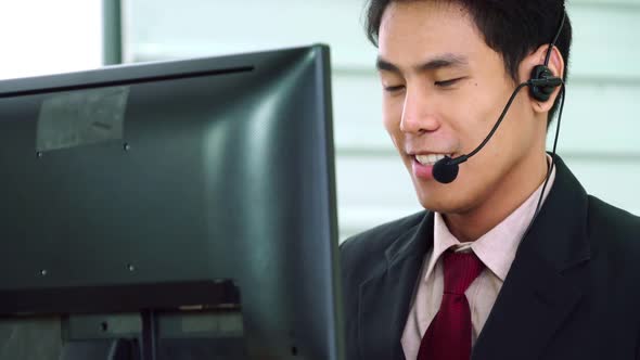 Business People Wearing Headset Working in Office