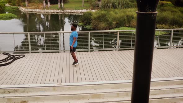 Aerial shot of a man working out in the park