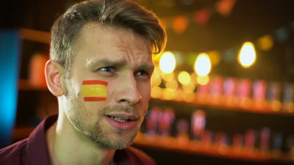 Happy Spanish Football Supporter With Flag on Cheek Shouting, Team Scoring Goal