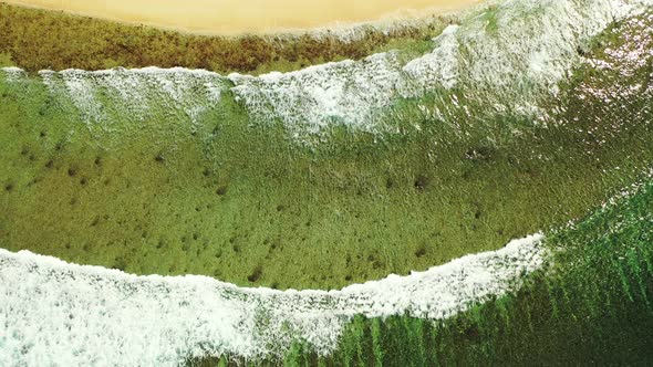 Natural aerial clean view of a paradise sunny white sand beach and blue sea background in colorful 4