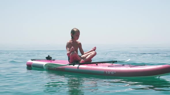 Kid on Paddle Board