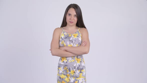 Young Beautiful Multi-ethnic Tourist Woman with Arms Crossed