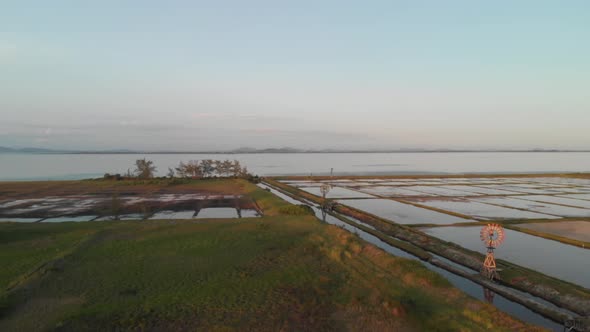 Aerial Shot Along The Fiel And Lake