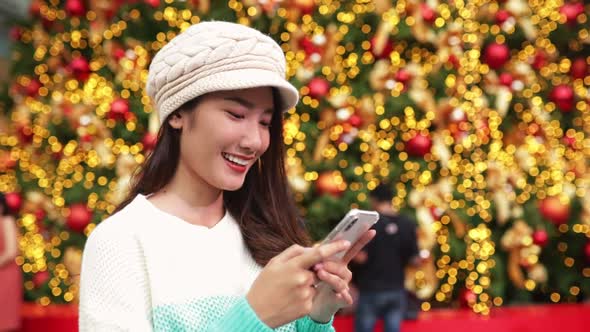 Merry Christmas and Happy New Year. Young  asian couple with Christmas