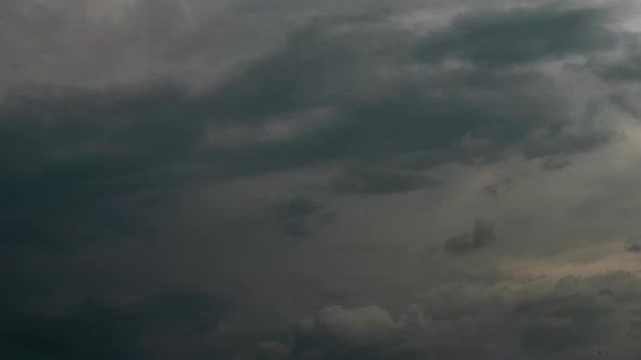 Time lapse of dark storm clouds are moving fast