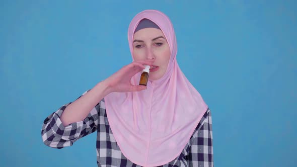 Young Muslim Woman Having Trouble Breathing Runny Noseuses Nose Spray