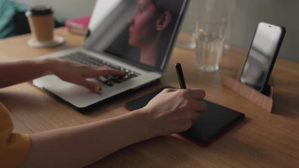 Woman Working with Photos on Her Laptop