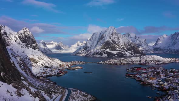 Reine Village and Mountains in Winter. Lofoten Islands, Norway. Aerial View