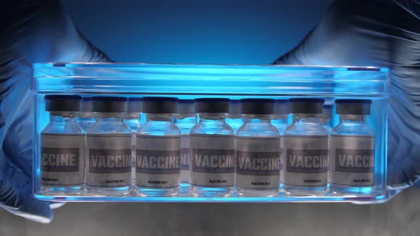 Glass vials for vaccine in laboratory. Group of vaccine bottles. Medicine in ampoules.