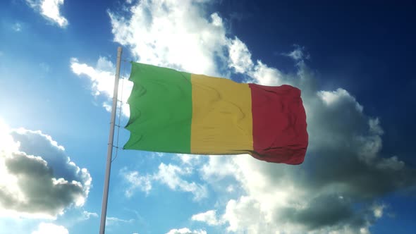 Flag of Mali Waving at Wind Against Beautiful Blue Sky