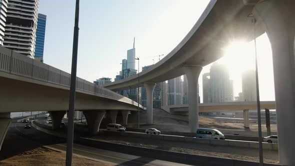 Highway Intersection with Lots of Traffic on the Foreground of Dubai Marina