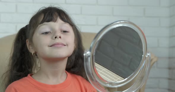 Child Examined Herself in Mirror