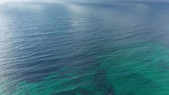 White Clouds in the Blue Sky Over the Sea Video . Pacific Ocean Beach Panorama