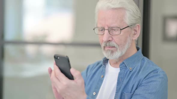 Senior Old Man Using Smartphone