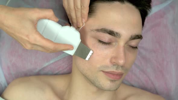 Ultrasonic Face Cleaning Young Male