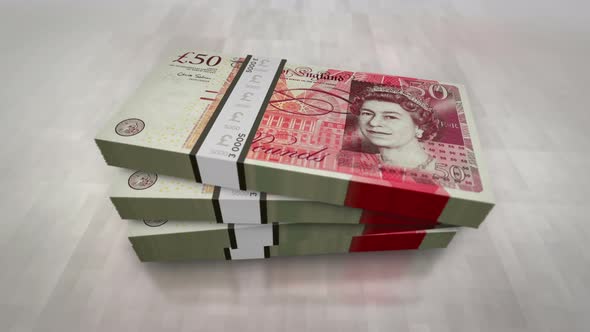 Pound Sterling British money banknote pile packs