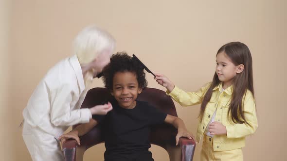 Friendly Diverse Kids Play Hairdressers.