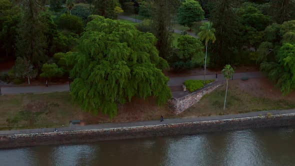 Kangaroo Point Promenade With People Strolling In Brisbane, Queensland, Australia. Aerial Drone Shot