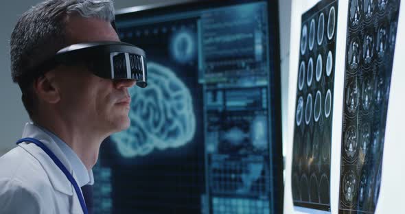 Doctor Examining Brain Scan with VR Headset