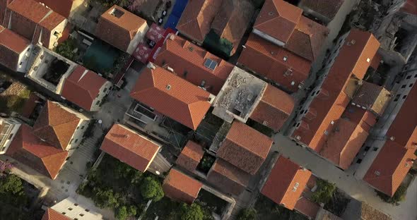 Aerial birds eye view of the red roof buildings in Ston, an ancient walled city like Dubrovnik, in C