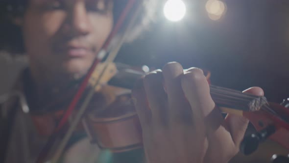 Young Black Violin Player Performing Classical Music