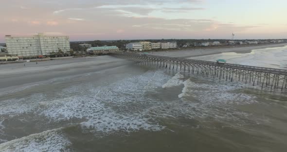 Aerial of Folly Beach Fishing Pier at Sunrise with Tides Resort