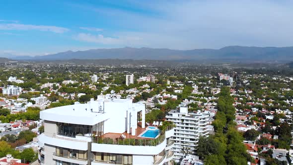 Rooftop Swimming pool Skyscrapers Apartments Andes Mendoza Argentina aerial view